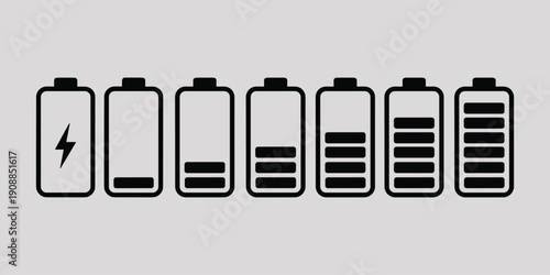 Battery with different charge levels on gray background battery charge levels black and white energy.