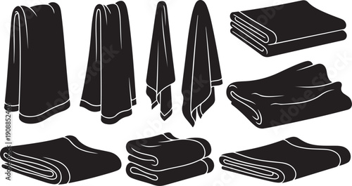 Collection of black towels in various folded positions displayed
