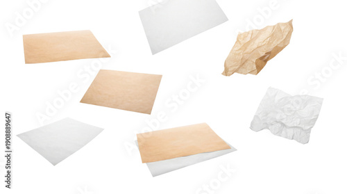 Fotografi a dynamic arrangement of baking parchment and crumpled parchment paper pieces scattered across a transparent background, showcasing culinary supplies