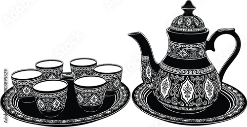 Black Teapot and Cups on Decorative Trays