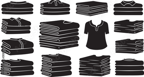 Stacks of neatly folded black clothes on white background