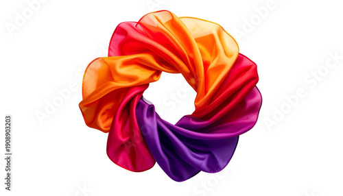 Vibrant circular cloth arrangement, gradient of red, orange, and purple, floating on black