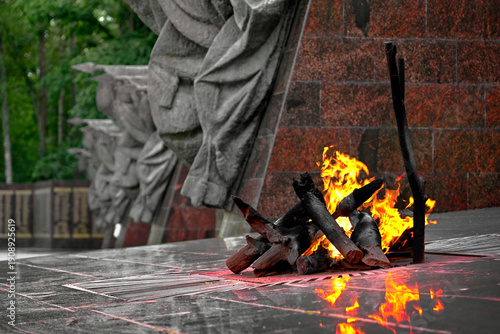 Konstfotografi Eternal flame in the form of a bonfire at the Partisan Glade memorial complex, B