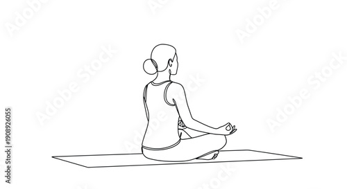 Woman meditating in lotus position on yoga mat, serene and focused