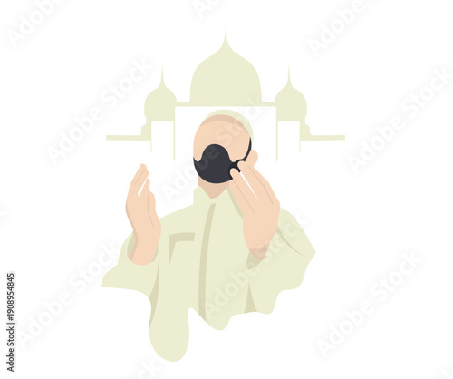 Muslim Man Praying with Face Mask in Front of Mosque Silhouette