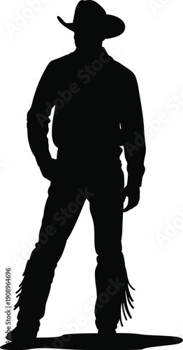 Cowboy silhouette wearing hat, western chaps with fringe, standing pose, traditional cowboy attire, rustic western culture, iconic rugged individualism
