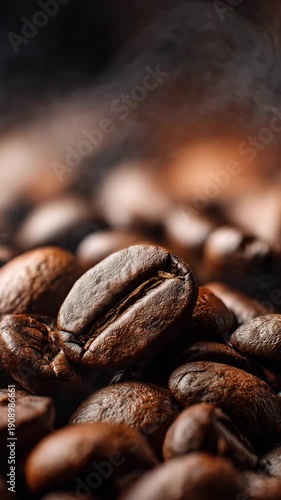 A macro closeup of roasted espresso coffee beans on a dark wooden background highlights the aromatic brown seeds for a perfect morning breakfast beverage or cafe mocha
