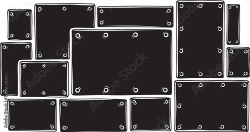 Collection of black metal plates with silver rivets arranged