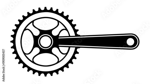 Black bicycle crankset and pedals in a stark silhouette
