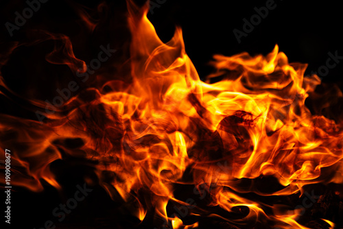 Fire flame background. Fire burning energy concept. Fire intense motion. Fire dramatic glow effect.