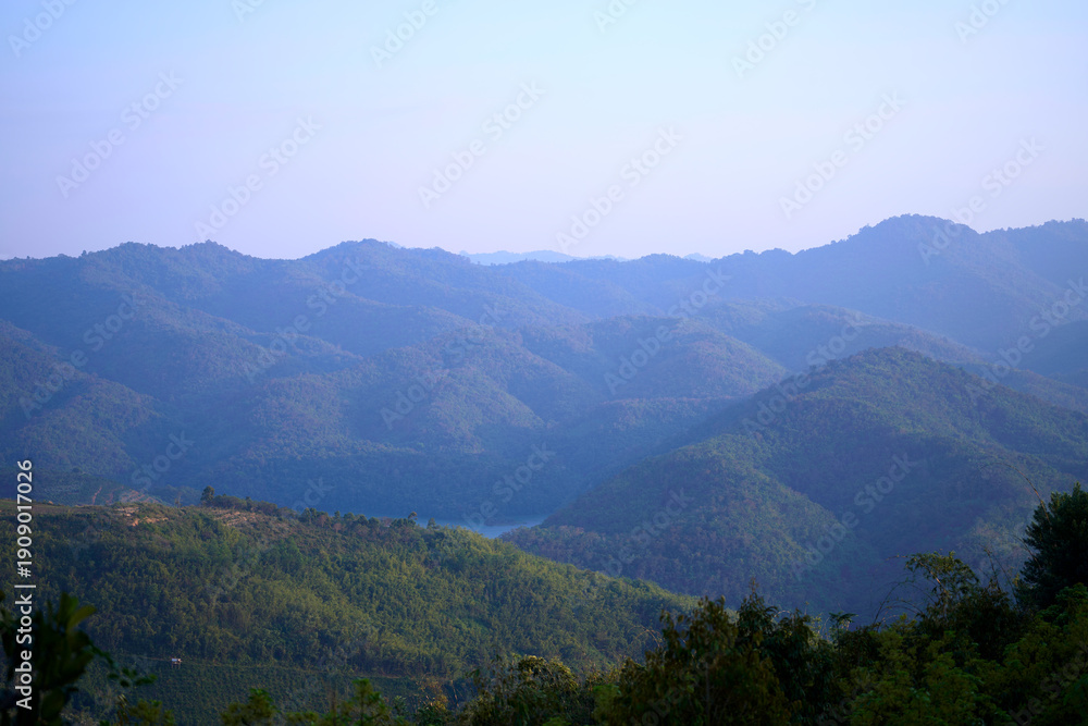 Naklejka premium mountain landscape with clouds