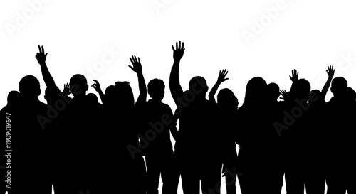A group of people with their hands raised in a celebratory gesture