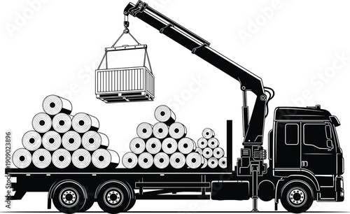 Heavy duty flatbed truck with hydraulic crane arm loading industrial cargo container and stacked paper rolls for logistics transport isolated on white background.