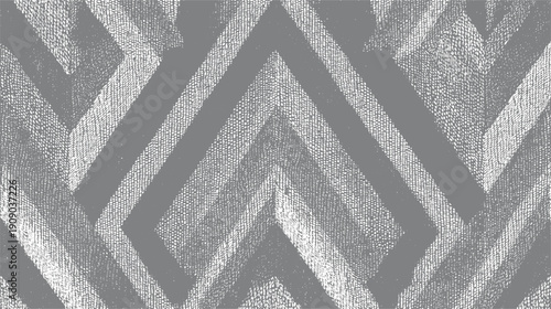 Geometric textured pattern of interlocking chevron shapes in grayscale abstract background