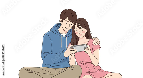 Couple playing video games on handheld console together, enjoying leisure time