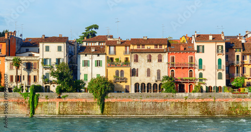 Wallpaper Mural Colorful facades of old houses in morning sun, Verona, Italy Torontodigital.ca