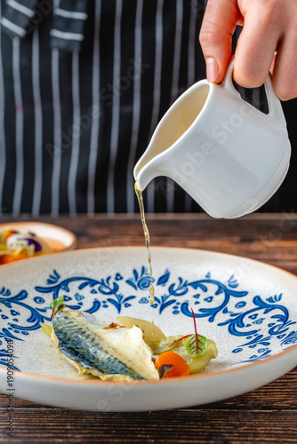 Wallpaper Mural Fish fillet served with vegetables on traditional ceramic plate Torontodigital.ca