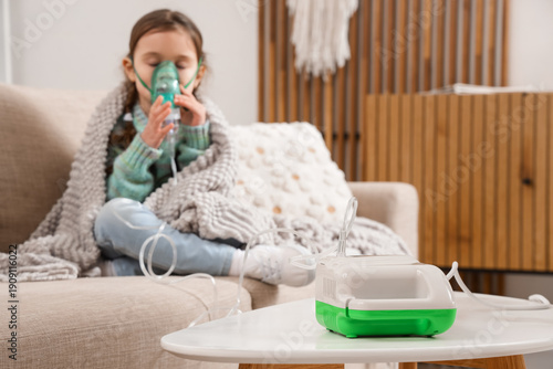 Nebulizer on table against ...