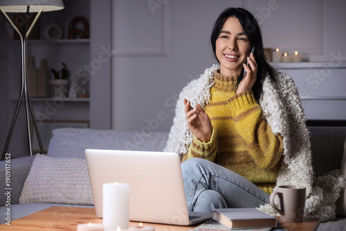 Young woman with plaid talk...
