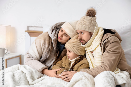 Frozen family with winter c...