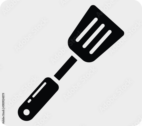 Black silhouette of a spatula