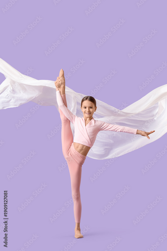 Naklejka premium Cute girl with fabric doing gymnastics on lilac background