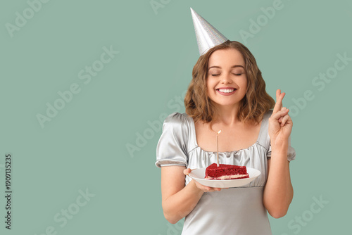 Young woman in party hat wi...
