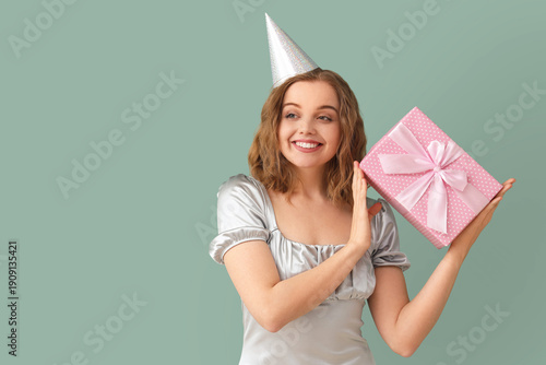 Happy young woman in party ...