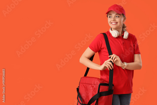 Female courier with food ba...