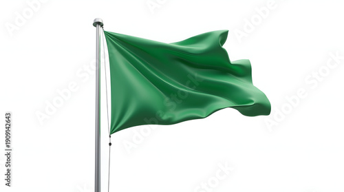 A vibrant green flag waving gently in the breeze against a light background.