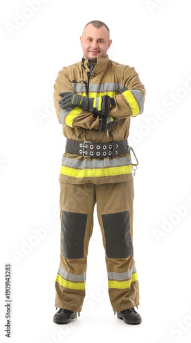 Male firefighter on white b...
