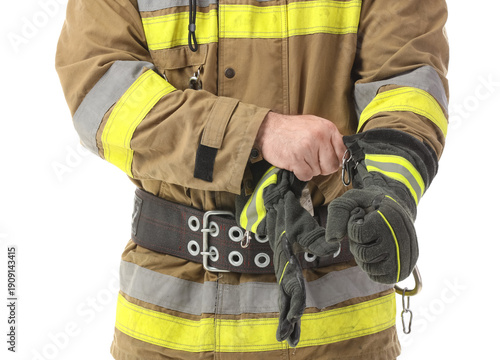 Male firefighter putting gl...