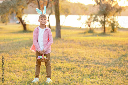 Little boy with bunny ears ...