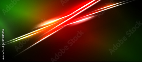 Abstract vibrant lines intersect over dark background. Colors blend, creating dynamic visual effect. Brightness contrasts sharply with shadows.