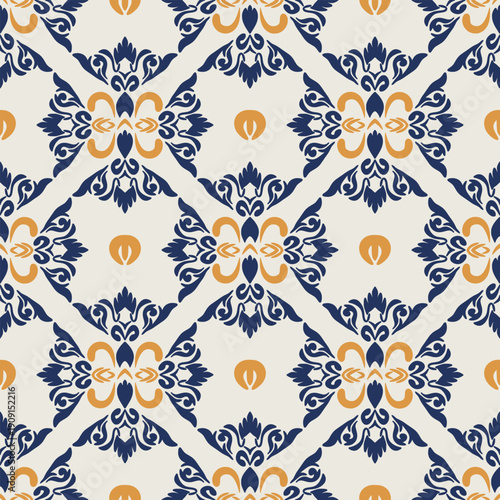 Elegant damask seamless pattern with floral geometric elements in navy blue and mustard gold colors