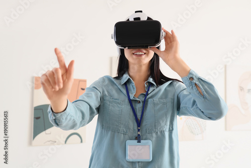 Young woman using VR glasse...
