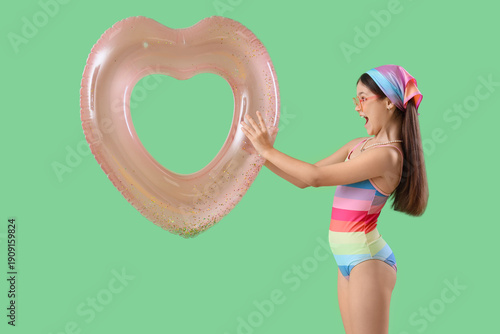 Cute girl with heart shaped...