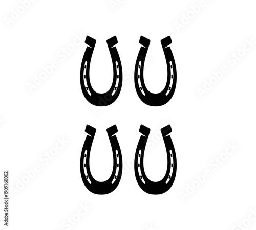 A simple graphic displays four black horseshoe shapes arranged in a two by two grid on a white background