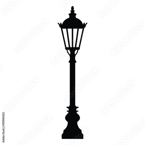 A black silhouette of a vintage ornate street lamp on a white background