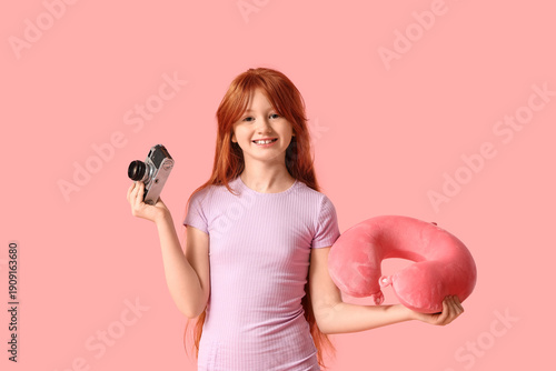 Cute girl with photo camera...