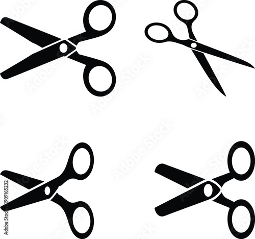 Four pairs of scissors in different orientations on a white background.