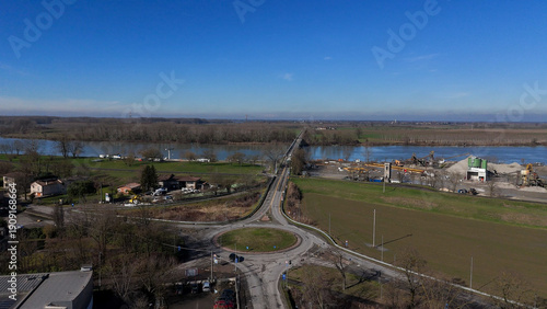 Принти на полотні Po River bridge connecting San Nazzaro in Monticelli d'Ongina, Emilia Romagna, I