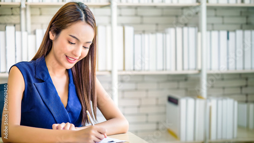 Business woman or secretary take note on paperwork or sign contact while business meeting at office, business financial presentation conference concept