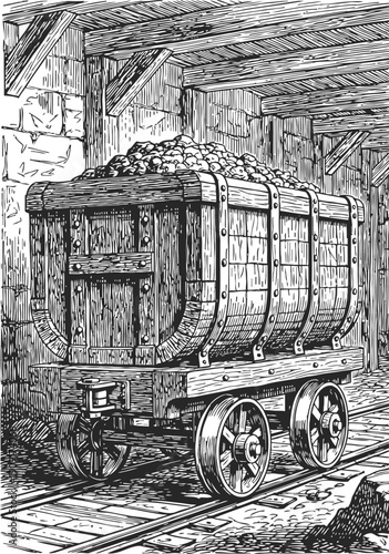 Old wooden mine cart filled with rocks on metal rail tracks inside stone mine tunnel