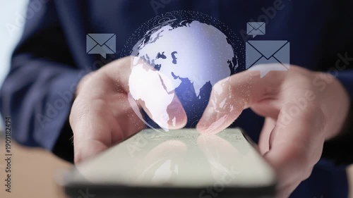 Businessman Sending Emails With Global Hologram