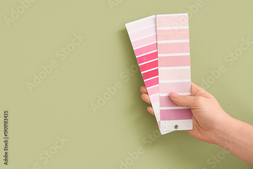 Female hand with pink color...