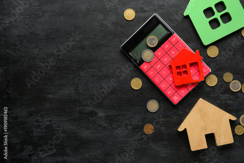 Calculator with house figur...