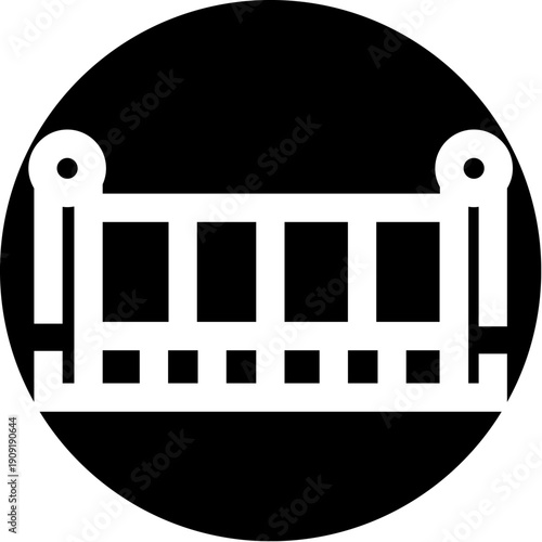 Baby crib icon featuring a white silhouette of a cot against a solid black circle background, ideal for depicting childcare, infancy, and early childhood concepts