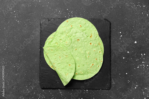 Board with round green lava...