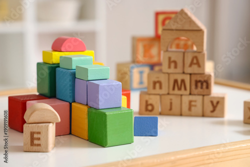 Wooden cubes on table in ch...